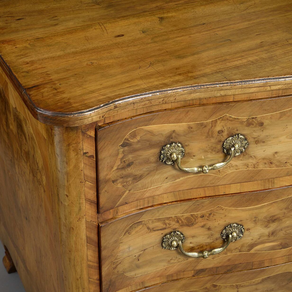 Mid-18th century louis xv period serpentine walnut commode