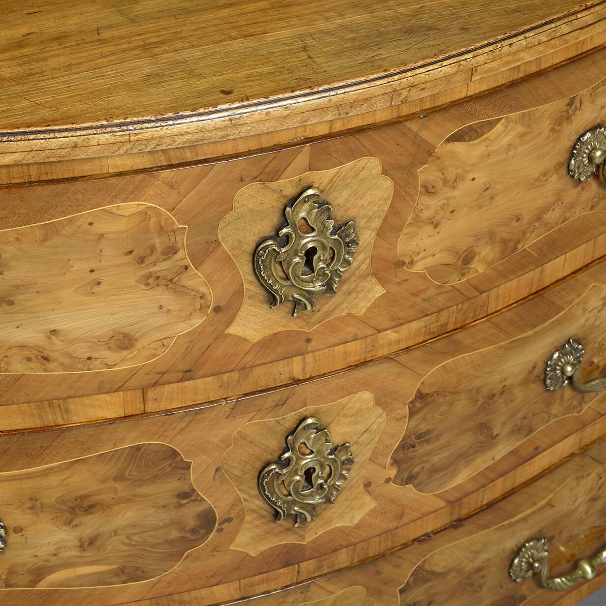 Mid-18th century louis xv period serpentine walnut commode