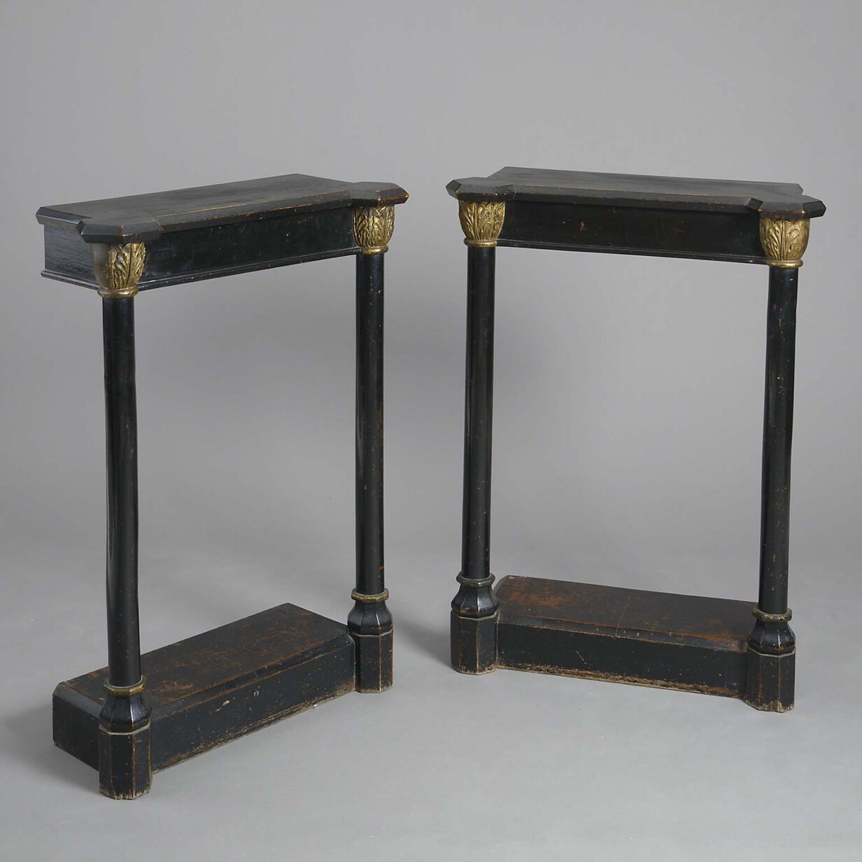 Pair of early nineteenth century regency gothick ebonised console tables