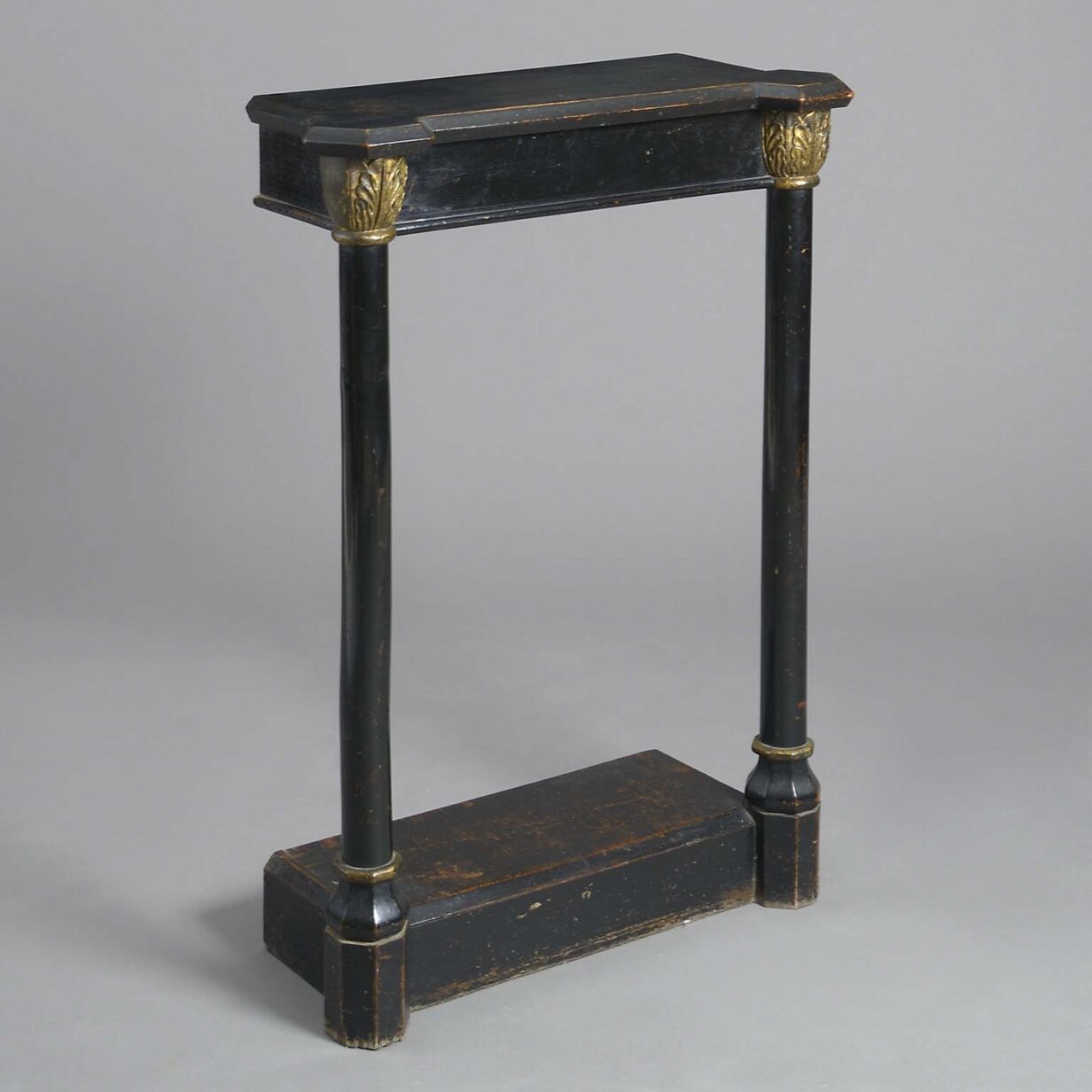 Pair of early nineteenth century regency gothick ebonised console tables