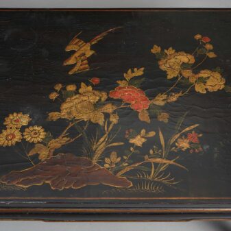 Early 20th century black lacquer panel as a low table