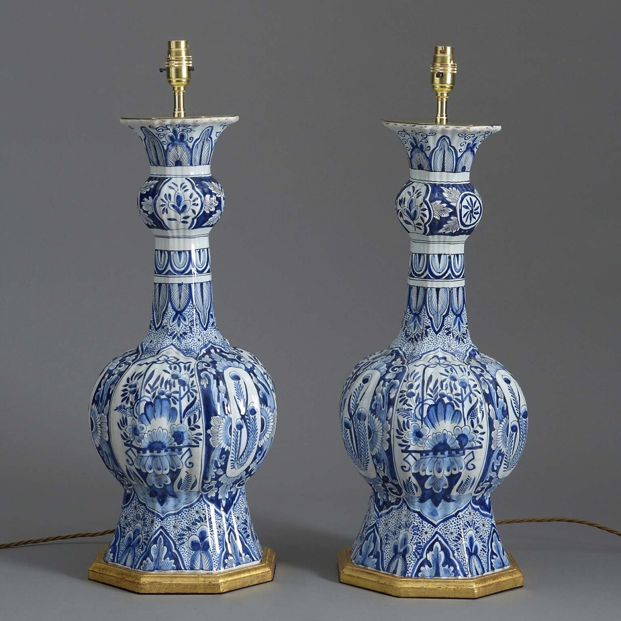 Pair of late 19th century blue & white glazed delft vase lamps