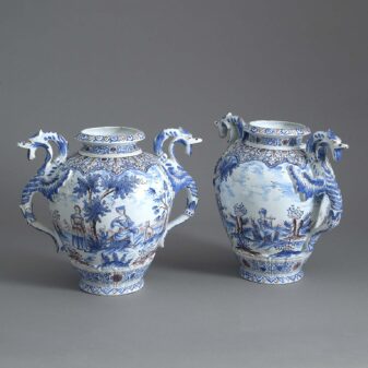 Pair of 19th century blue, white and manganese glazed faience vases